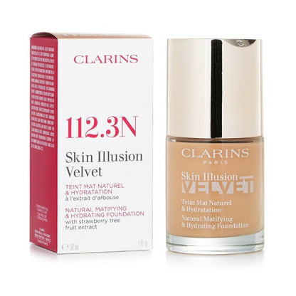 Clarins Skin Illusion Velvet Natürliche mattierende und feuchtigkeitsspendende Grundierung – Nr. 112.3N Sandelholz, 30 ml